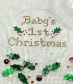 Kate Dickerson Needlepoint - Christmas Ornament w/Clear Dome & Confetti - Baby's First Christmas